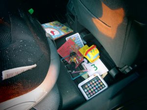 doll, car, doll in car, toys in car, toys