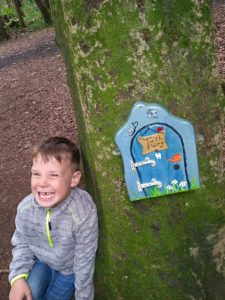 little boy, toothfairy, woods, forest, tree, fairy walks, smiling boy